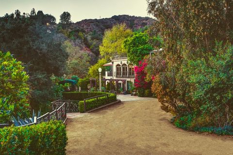 Rent Harry Houdini's Magical LA Estate On Airbnb — And Then Get Lost In Its Hidden Caves & Tunnels