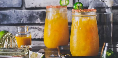 Add A Tropical Touch To Booze Hour With These Refreshing Mango Cocktail Recipes