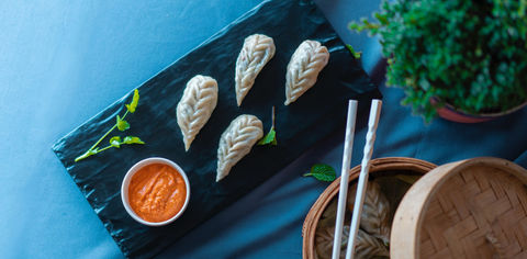 Take Your Taste Buds On A Ride At These 9 Places That Serve Delicious Momos In Delhi