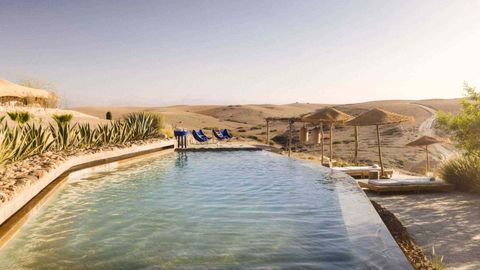 This New Glamping Hotel In The Moroccan Desert Has Outdoor Pools, 20 Luxe Tents And Camels To Ride