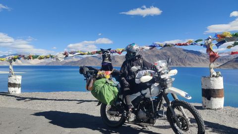 Going Places With People: This Traveller Visited The World's Highest Motorable Road With His Dog...On A Bike!