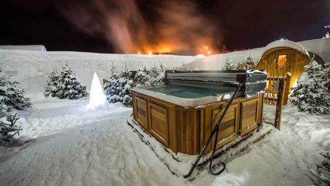 The Only Ice Hotel In North America Just Opened For The Season — And It Has Hot Tubs And Saunas Under The Stars