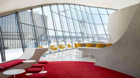 The Best Airport Bars Around The World — Including A '50s Plane Turned Cocktail Lounge