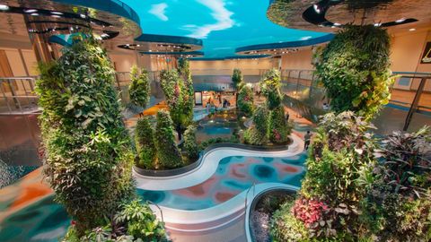 Changi Airport T2 Reopens: Discover A 4-Storey Waterfall, A Robot Bartender And More!