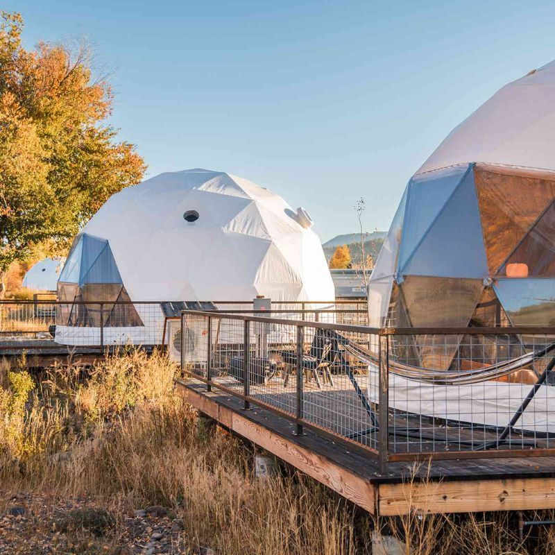 This New Colorado Eco Hotel Has 14 Geodesic Domes With Private Wraparound Decks & Hammocks