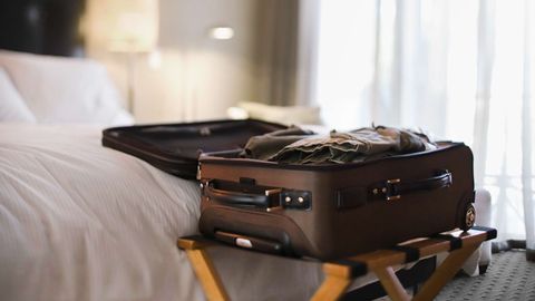 Here's Why Leaving Your Luggage on the Floor of a Hotel Room Isn't Best Practice