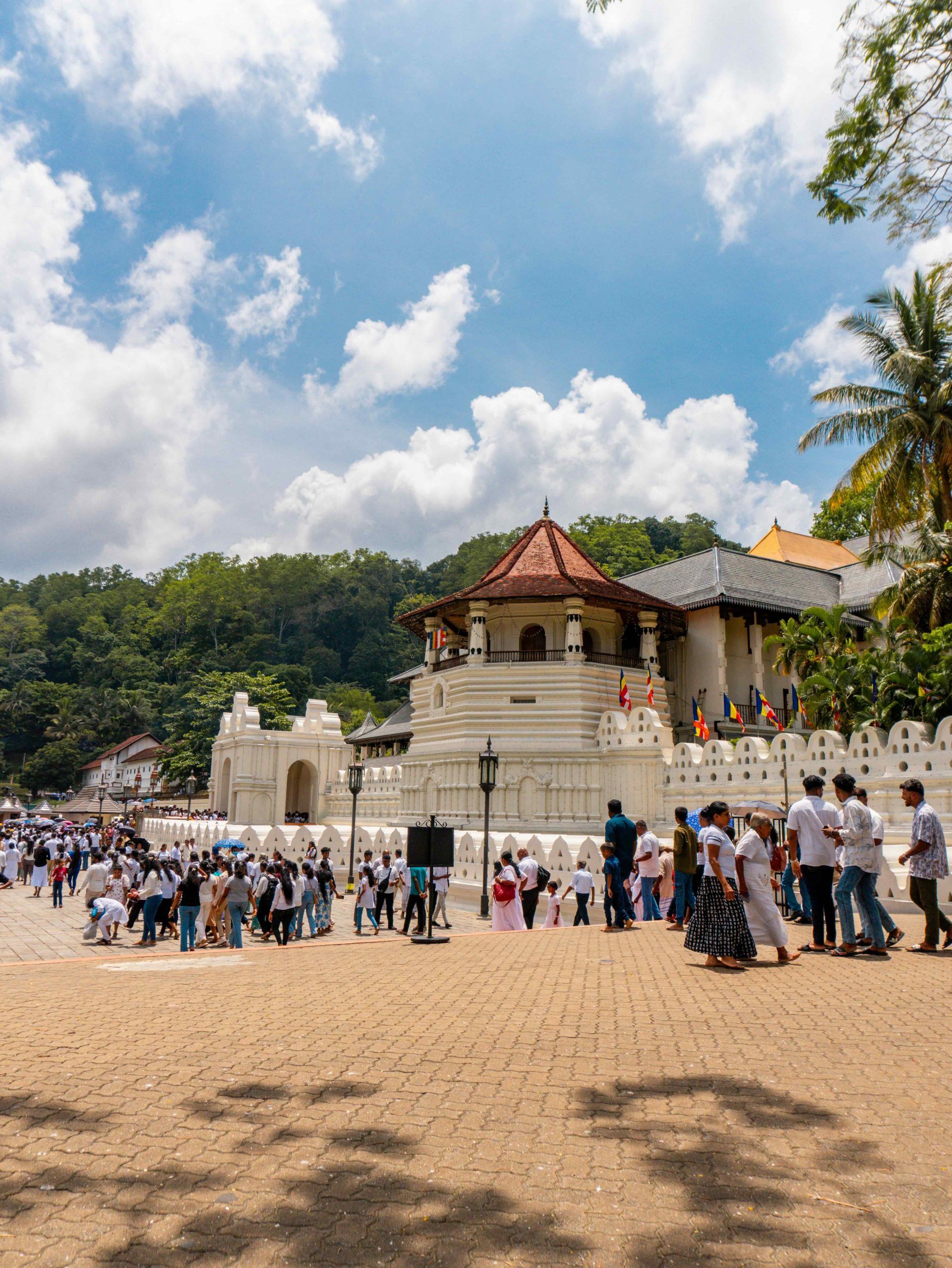 People dressed in white at the Temple of the Tooth