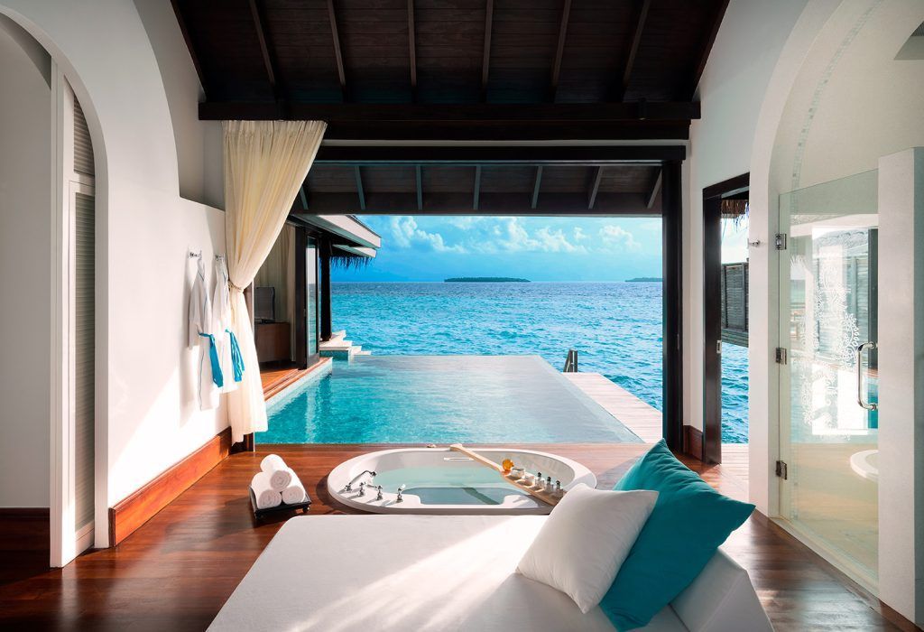 Overwater Pool Villa bathroom (note the glass-bottom tub)