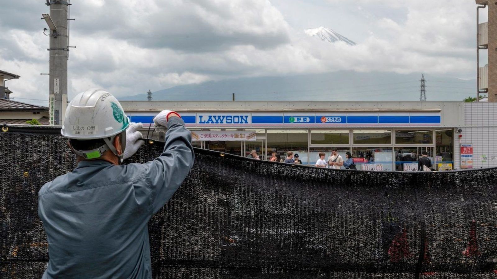 Japanese Town Blocks Iconic Mount Fuji Views To Manage Crowds