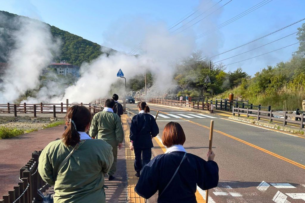 The power-walking with a group of tracksuit-wearing Japanese