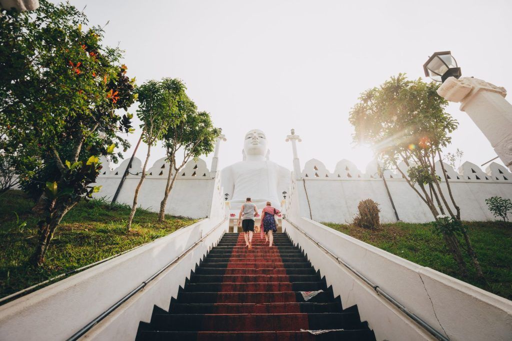 Tourists a the Bahiravokanda Viharaya Buddha temple in Kandy