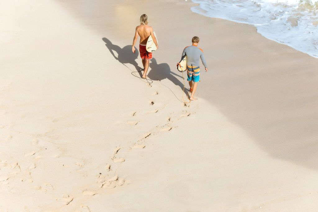 Surfers at Bingin Beach, Bali