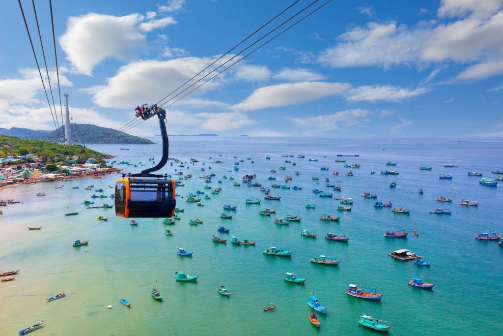 Top view of Vietnamese fishing boats in the turquoise sea on Phu Quoc