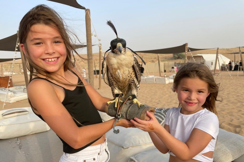 Harley and Blake try falconry. Photo by Jenny Hewett