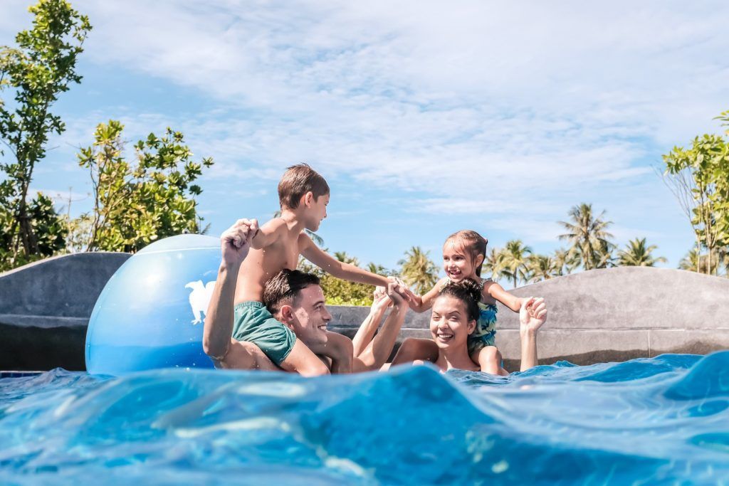 Family time in the pool is easy at JW Marriott Khao Lak Resort & Spa.