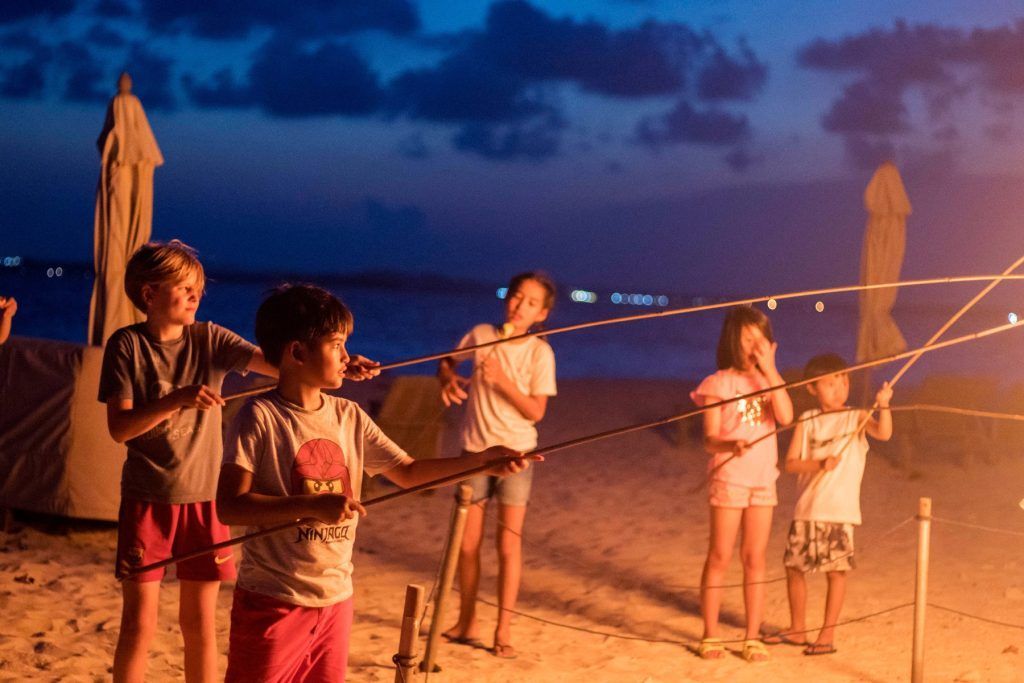 By the bonfire at Nikoi Island, Indonesia - hotel kids activities