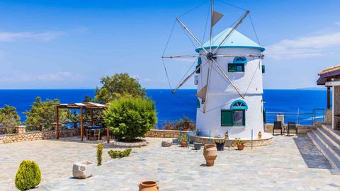 This Greek Island Has An Adorable Town, Incredible Food &amp; A Famous Shipwreck Beach