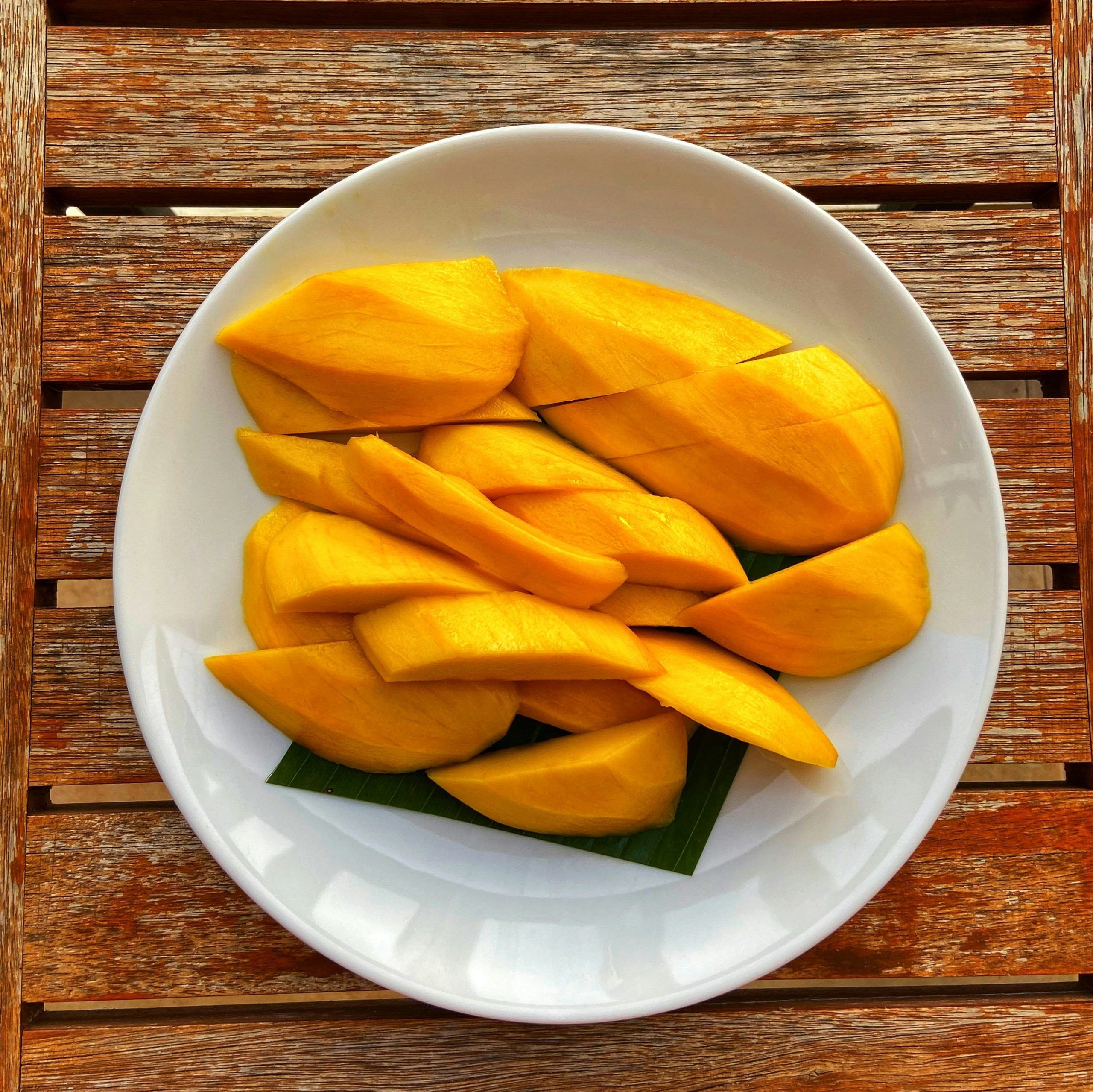 <b>Mangoes</b> thrive in Thailand’s tropical climate. 