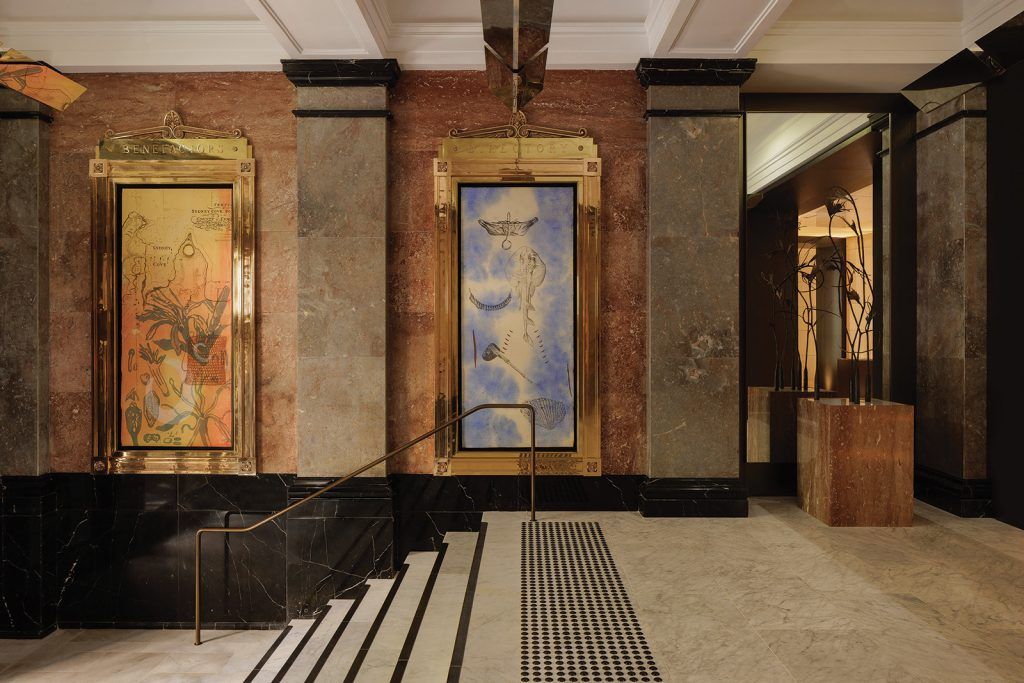 Restored brass frames hold work by First Nations artist Judy Watson