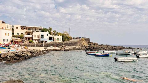 This Remote Italian Island Has Dramatic Landscapes, Hot Springs, And Vineyards