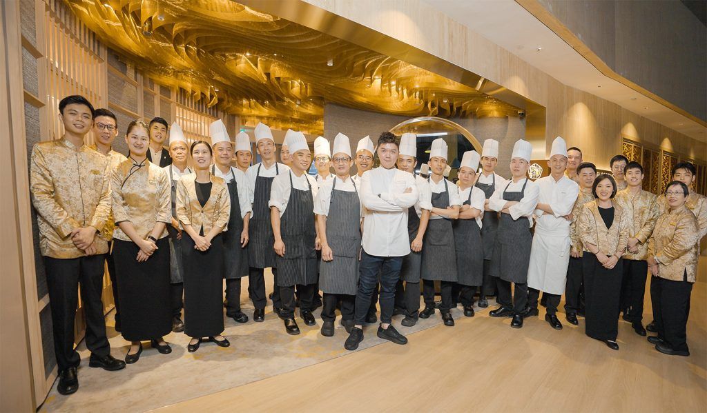 Peach Blossoms Executive Chef Edward Chong with Culinary and Service Team