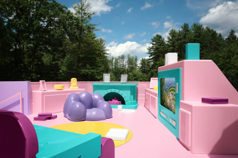 a photo of the plastic furniture from Airbnb's life-sized Polly Pocket dollhouse experience