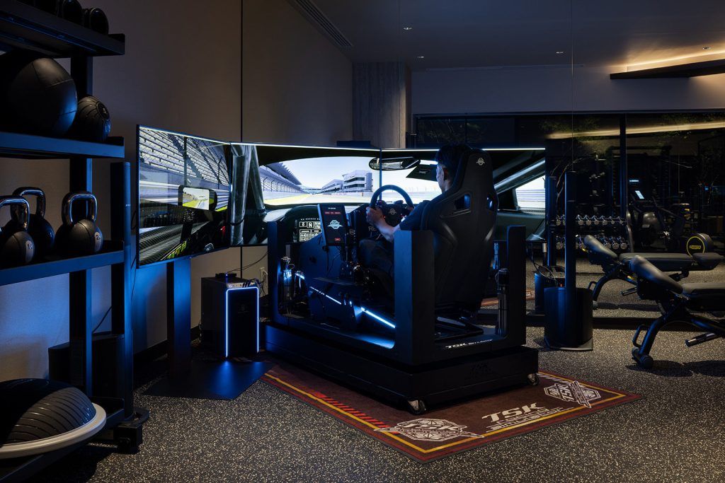 The 24-hour Fitness Gym features a professional racing simulator